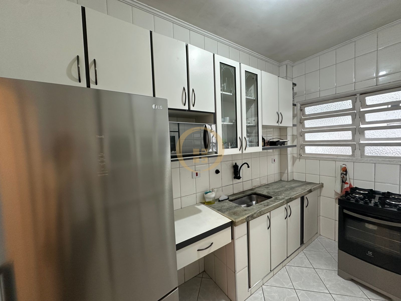 Apartamento na Praia das Pitangueiras, Guarujá - SP