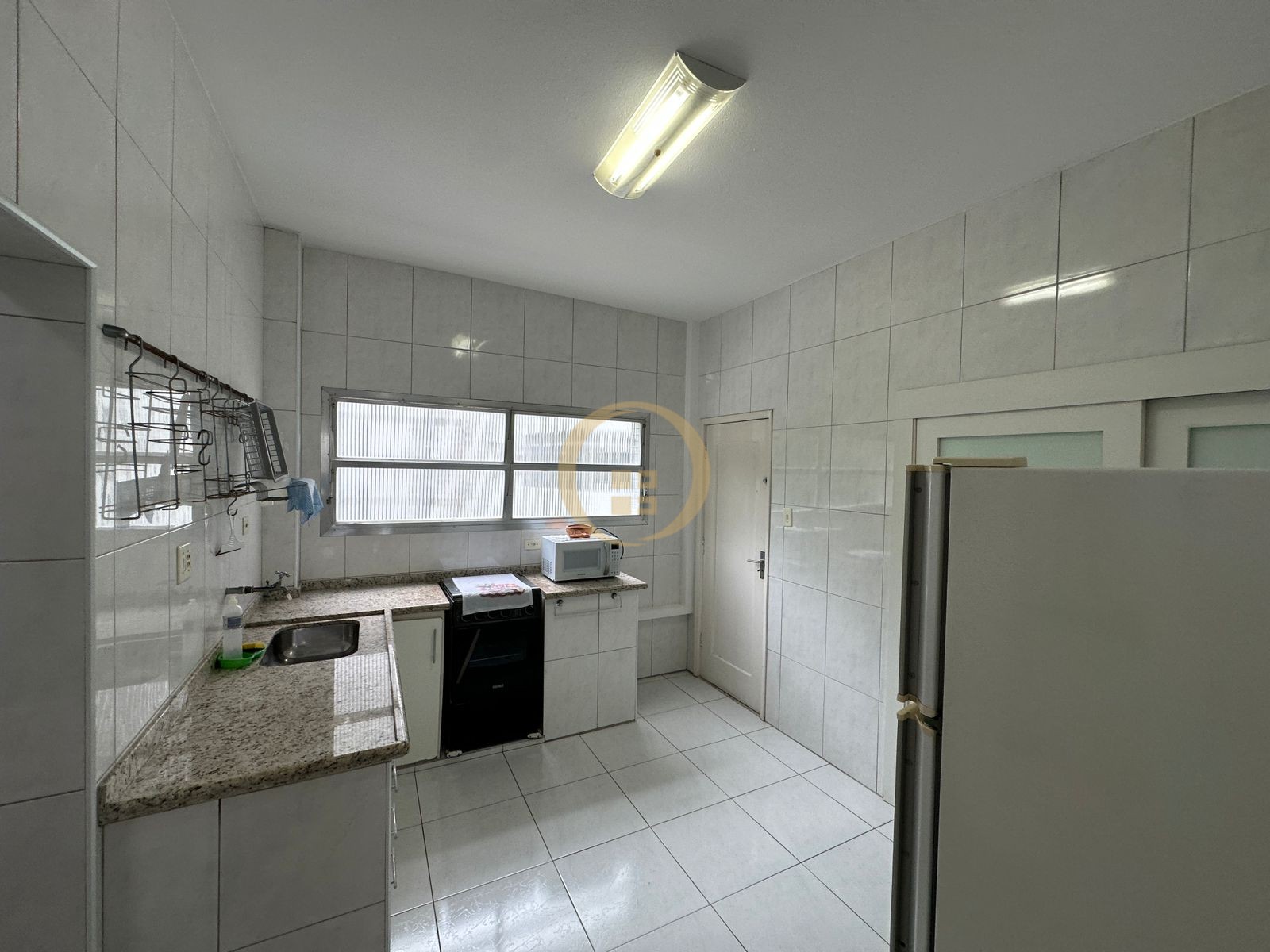 Apartamento na Praia das Pitangueiras, Guarujá - SP