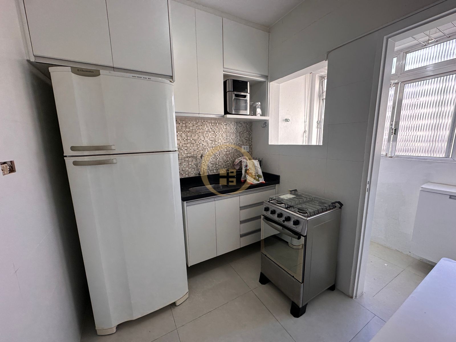 Apartamento na Praia das Pitangueiras, Guarujá - SP